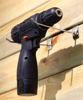100 Pack Slatwall Hooks 6 And 8 Inch Silver Metal Pegs for Garage Shop Retail Display holding a drill on wooden panel