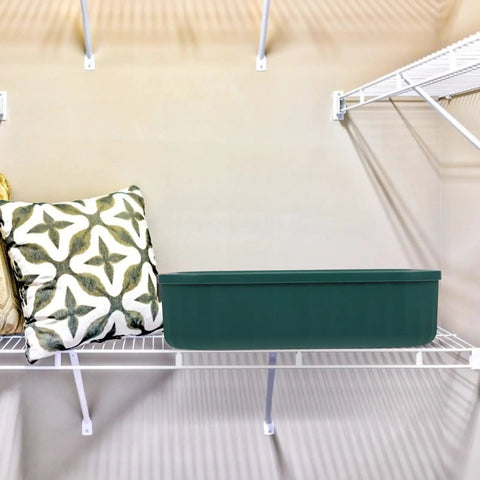 Slick Multi Compartment Heavy Duty Plastic Drawer Storage Container With Secure Top placed on a shelf beside decorative pillows.