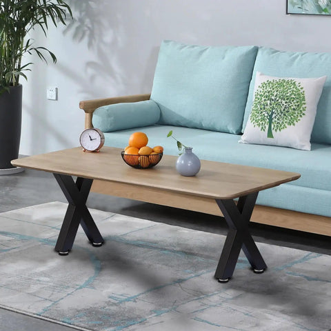 X Shape 16 Inch Iron Bench Legs Set Of 2 supporting a modern coffee table in living room scene with black powder coat finish