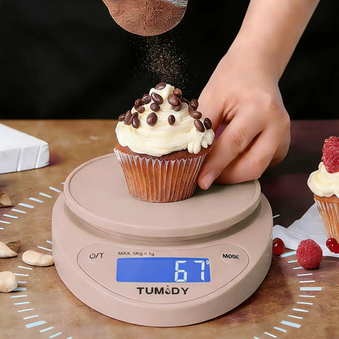 Pink Digital Kitchen Scale 11lb/5kg Capacity With 1g Precision weighing a cupcake with large LCD display