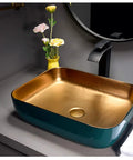 Above counter vessel sink, solid porcelain ceramic bowl, 50x40x13 cm, smooth gold interior, upgrades any vanity instantly.