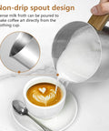 8 In 1 Milk Frother And Steamer With 550 Watts Power, 21 Ounce Split Stainless Steel Pitcher pouring milk froth into coffee cup