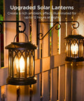 4 Pack Solar Lanterns Outdoor Lights For Garden And Patio, Upgraded Waterproof Hanging Solar Powered Lanterns lit on fence