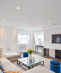 Bright living room with Six Pack 8 Inch LED Recessed Lights With Junction Box, Ultra Thin Canless Wafer Downlights, 6000K Daylight installed.