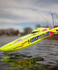 Hand launching Blackjack 24 Inch V2 Catamaran Brushless RC Boat With Heat Wave Visual RTR Ready To Run over water