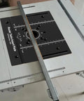Built Tough Anodized Aluminum Router Insert Plate With Dead On Miter Grooves, secured on a router table for precise cutting.