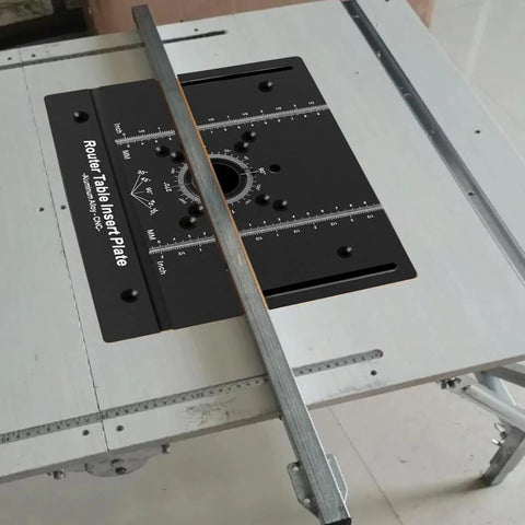 Built Tough Anodized Aluminum Router Insert Plate With Dead On Miter Grooves, secured on a router table for precise cutting.