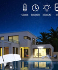 Plug In Outdoor Flood Light With Motion Sensor And Remote Control illuminating a modern house exterior at night, 3500 Lumens
