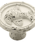 Seaside Cottage Angel Fish Cabinet Knob In Vintage Antique White Finish One And Three Eighths Inch Diameter Easy Install Kitchen Hardware For Cabinets And Drawers With Coastal Vibe