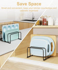 Heavy Duty Metal Cutting Board Storage Rack And Baking Sheet Organizer 2 Pack For Cabinet Shelf Space Saving Plate Holder And Cookie Sheet Dividers Durable Design For Easy Access holding cutting boards on a kitchen countertop.