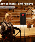 Person installing Auto Retracting 50 Foot Heavy Duty Cord Reel For Garage And Workshop, 14AWG 3C SJTOW Power Cord with tools.