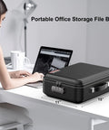 Woman using laptop beside Hard Shell Fireproof Document Safe Box With Lock Waterproof Fire Resistant Storage 15x11x5 inches