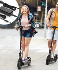 Two people ride electric scooters with inset of 42V Replacement Charger For Electric Scooters That Fit S2 Pro S2 Lite S2 KS4 KS4 Pro NEX NEX3 NEX5 Max Max3 Max V2 With Barrel Round Plug Tip Not 3 Prong Durable Power Supply For Safe Fast Charging.