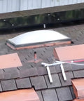 Heavy Duty Rooftop Sprinkler System For Wildfire Defense Featuring A Built Damn Tough Black Frame and Premium Brass Nozzles on shingles.
