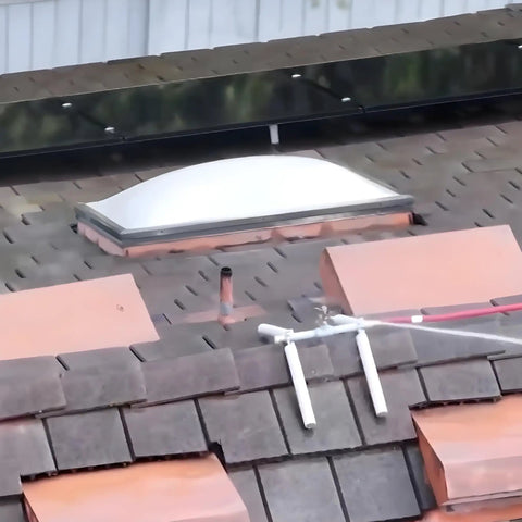 Heavy Duty Rooftop Sprinkler System For Wildfire Defense Featuring A Built Damn Tough Black Frame and Premium Brass Nozzles on shingles.