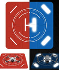 Nighttime Reflective Drone Landing Pad, Fast Fold Double Sided Waterproof Landing Mat shown in red and blue with drone model