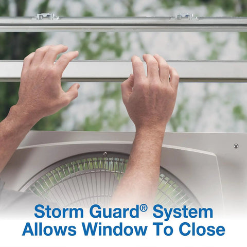 Hands demonstrating Storm Guard on 16-Inch Window Fan With Storm Guard, Built Tough With Impact-Resistant Plastic Housing.