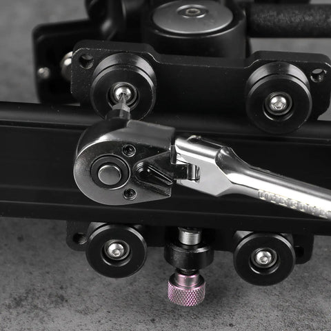 Close-up of Four Piece Inch Drive Ratchet Set With Flexible Head And Quick Release The Go To Beast Tool for Tight Spaces in use on machinery.
