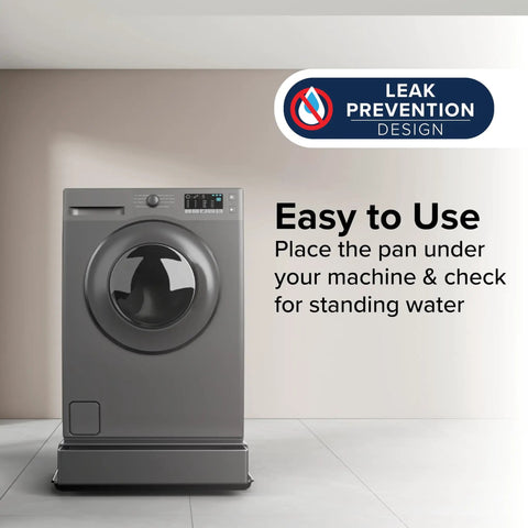 Low Profile Washing Machine Drain Pan With PVC Fitting For Front Loaders, 29 Inch By 33 Inch ID And 30.5 Inch By 34.5 Inch OD shown under washer