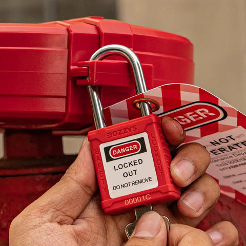 Close-up of Lockout Tagout Locks 6 Pack OSHA Red LOTO Locks Keyed Different being used on industrial machinery.