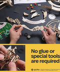 Hands assembling Harry Potter Quidditch Pinball Machine 3D Wooden Puzzle Kit For Adults To Build, parts and no-glue message visible
