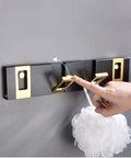 Heavy Duty Nail Free Wall Coat Rack With Sleek Hidden Hooks For Bathroom Bedroom And Entryway Zero Mess Setup, showing a hand using a gold hook.
