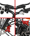 Set of two red four-piston hydraulic e-bike brakes with 180mm rotors, mounted on front fork and rear frame.