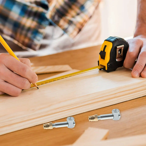 Person measuring wood with tape measure, 4 Piece 35mm Cabinet Assembly Screw Kit With Invisible Furniture Connectors nearby