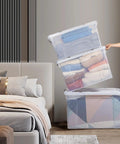 Big Boss 90 Quart Clear Plastic Storage Bins 8 Pack With Snap On Lids Heavy Duty Jumbo Tote Containers For Garage Closet Laundry Room Organization Of Bulky Items And Gear stacked with blankets in a modern bedroom.