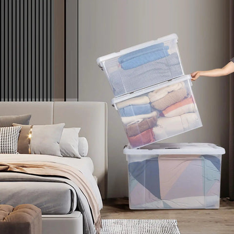 Big Boss 90 Quart Clear Plastic Storage Bins 8 Pack With Snap On Lids Heavy Duty Jumbo Tote Containers For Garage Closet Laundry Room Organization Of Bulky Items And Gear stacked with blankets in a modern bedroom.