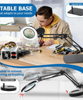 Engineer using hands free magnifying lamp with light and stand, 15X/30X magnifier glass for detailed electronic work, stable base shown.