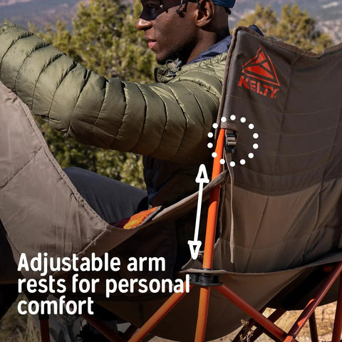 Person sitting on Two Person Camping Chair With Removable Blankets Low To The Ground Loveseat Nest Cozy Cuddle Recline Insulated Beverage Holders