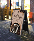 Heavy Duty Slide In A Frame Sidewalk Sign 24x36 Inches Double Sided Steel Frame Only Easy Poster Change Top To Bottom Or Bottom To Top For Corrugated Plastic Posters Black displaying coffee ad outside.