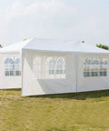 Outdoor Party Tent 10x20 Foot Canopy Gazebo With Removable Sidewalls Instant Event Tent For Catering Events Wedding Birthday Pavilion Beach BBQ Up To 30 People Waterproof Easy Setup shown in outdoor setting