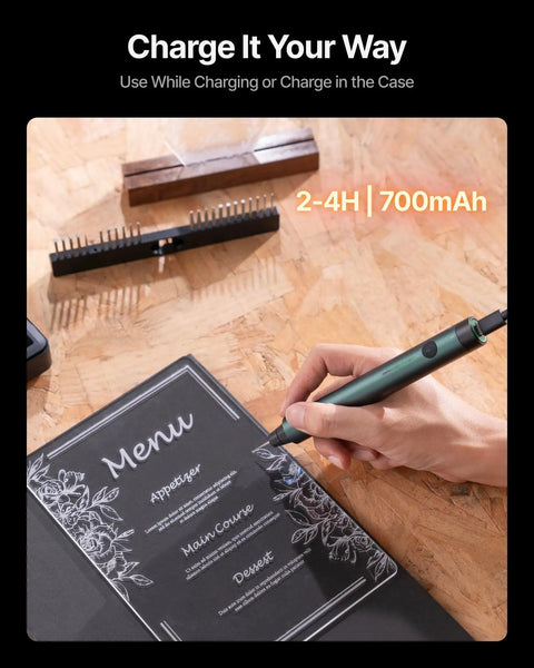 Handheld engraving pen etching a menu on glass, showcasing Daily Driver Portable Cordless Engraving Pen Handheld 5 In 1 Rotary Tool For All Materials Featuring Hella Smooth Multi Speed Motor And Killer Precision For Metal Wood Glass Leather And Jewelry Etching.