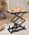 Heavy Duty Electric Scissor Lift Table With 140 Pound Hydraulic Adjustable Height Remote Manual Control Top Shelf with cat on top