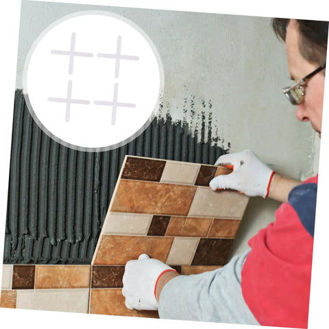 Man installing ceramic tiles using Pro Grade Tile Wedges And Spacers Kit for Quick Ceramic Tile Leveling Reusable PE Material Spacers