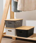 Top Tier Stackable Storage Bins With Bamboo Lids Set Of Six Heavy Duty Bpa Free Plastic Baskets on shelf, showcasing matte finishes.