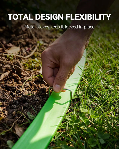 Hose being staked into the ground, showcasing Flat Soaker Hose With Stakes 50Ft Watering Made Easy For Garden And Lawn Yard Irrigation.