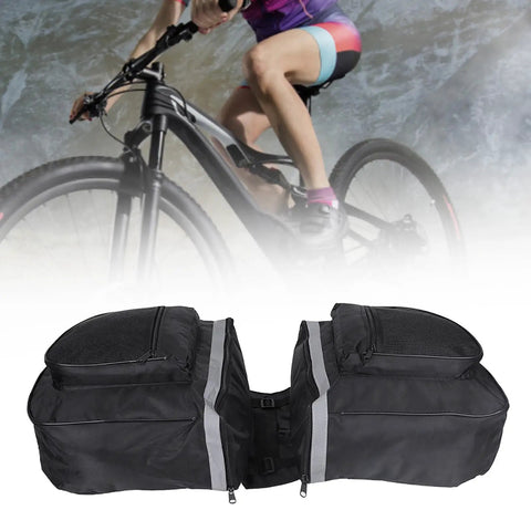 25L Bike Rack Bag For Rear Carrier Double Pannier Trunk Storage With Side Pockets Mountain Road Ready Tote For Adults Ideal For Groceries And Tools For Everyday Commutes in black, displayed with a cyclist in the background.