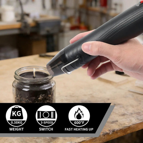 Hand using Pro Craft Heat Gun 110V 350W With Ultra Long 3.28Ft Cord on candle in workshop, showing 0.38kg weight and 600°F heat.