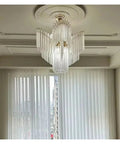 Modern Glass Pendant Light LED Hanging Lamp For Living Room Decor, Sleek steel and glass chandelier with unique design.