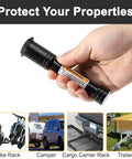 Hand holding Black Five Eighths Inch Hitch Pin Lock With Keys For Two Inch Receiver Anti Theft Trailer Hitch Pin Keyed Alike