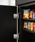 Soft Close 1/2 Overlay Brushed Nickel Kitchen Cabinet Door Hinges For Face Frame Cabinets on a cupboard with snacks visible.