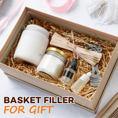 Gift box with 2 Lb Kraft Crinkle Paper Filler Brown Shredded Paper for Gift Baskets featuring candles and small bottles.