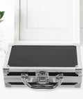 Heavy Duty Metal Briefcase Toolbox With Rugged Handle And Smart Compartments Built Solid For On The Go Handymen Fixing Cars Or Stashing Daily Gear, top view showing black case with silver accents.