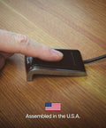Person using Fast USB Fingerprint Reader For Windows Hello And Passkey Login No Fuss Biometric Security For Your PC on desk.