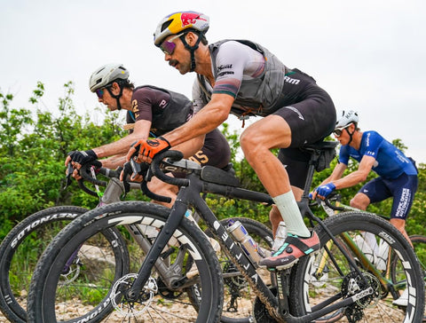 Cyclists riding on gravel road showcasing Endurance Formula Tubeless Bike Tire Sealant With Injector For MTB Road CX And Gravel Bikes
