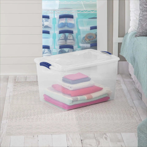 Heavy Duty SixtySix Quart Clear Plastic Storage Bins Two Pack With Blue Latch Lids Stackable Organizers for blankets in bedroom.