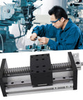 Precision Linear Motion Guide Actuator With Hand Wheel For CNC X Y Z Axes, 100mm Stroke Aluminum Alloy Stage Rail shown with technician.